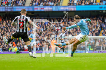 2023-03-05 - Jack Grealish (10) of Manchester City shoots towards the goal during the English championship Premier League football match between Manchester City and Newcastle United on 4 March 2023 at the Etihad Stadium in Manchester, England - FOOTBALL - ENGLISH CHAMP - MANCHESTER CITY V NEWCASTLE - ENGLISH PREMIER LEAGUE - SOCCER