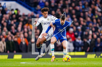 2023-03-04 - Leeds United midfielder Tyler Adams (12) wrestles with Chelsea midfielder Kai Havertz (29) during the English championship Premier League football match between Chelsea and Leeds United on 4 March 2023 at Stamford Bridge in London, England - FOOTBALL - ENGLISH CHAMP - CHELSEA V LEEDS - ENGLISH PREMIER LEAGUE - SOCCER