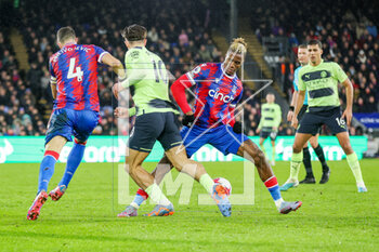 2023-03-11 - Crystal Palace forward Wilfried Zaha (11) fouls Manchester City midfielder Jack Grealish (10) during the English championship Premier League football match between Crystal Palace and Manchester City on 11 March 2023 at Selhurst Park in London, England - FOOTBALL - ENGLISH CHAMP - CRYSTAL PALACE V MANCHESTER CITY - ENGLISH PREMIER LEAGUE - SOCCER