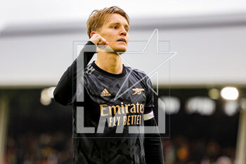 2023-03-13 - Martin Odegaard (8) of Arsenal celebrates at full time during the English championship Premier League football match between Fulham and Arsenal on 12 March 2023 at Craven Cottage in London, England - FOOTBALL - ENGLISH CHAMP - FULHAM V ARSENAL - ENGLISH PREMIER LEAGUE - SOCCER
