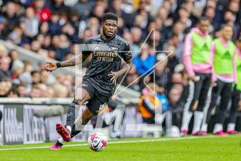 2023-03-13 - Thomas Partey (5) of Arsenal during the English championship Premier League football match between Fulham and Arsenal on 12 March 2023 at Craven Cottage in London, England - FOOTBALL - ENGLISH CHAMP - FULHAM V ARSENAL - ENGLISH PREMIER LEAGUE - SOCCER