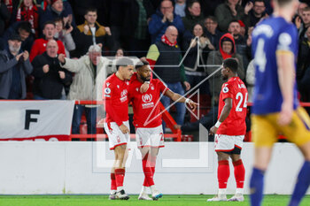 2023-03-17 - Nottingham Forest forward Emmanuel Dennis (25) scores a goal and celebrates to make the score 1-0 during the English championship Premier League football match between Nottingham Forest and Newcastle United on 17 March 2023 at the City Ground in Nottingham, England - FOOTBALL - ENGLISH CHAMP - NOTTINGHAM V NEWCASTLE - ENGLISH PREMIER LEAGUE - SOCCER