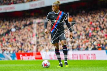 2023-03-19 - Crystal Palace forward Wilfried Zaha during the English championship Premier League football match between Arsenal and Crystal Palace on 19 March 2023 at the Emirates Stadium in London, England - FOOTBALL - ENGLISH CHAMP - ARSENAL V CRYSTAL PALACE - ENGLISH PREMIER LEAGUE - SOCCER