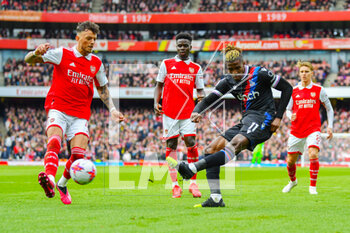 2023-03-19 - Crystal Palace forward Wilfried Zaha (11) and Arsenal defender Ben White (4) during the English championship Premier League football match between Arsenal and Crystal Palace on 19 March 2023 at the Emirates Stadium in London, England - FOOTBALL - ENGLISH CHAMP - ARSENAL V CRYSTAL PALACE - ENGLISH PREMIER LEAGUE - SOCCER