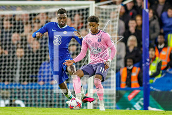 2023-03-20 - Benoit Badiashile (4) of Chelsea and Demarai Gray (11) of Everton during the English championship Premier League football match between Chelsea and Everton on 18 March 2023 at Stamford Bridge in London, England - FOOTBALL - ENGLISH CHAMP - CHELSEA V EVERTON - ENGLISH PREMIER LEAGUE - SOCCER