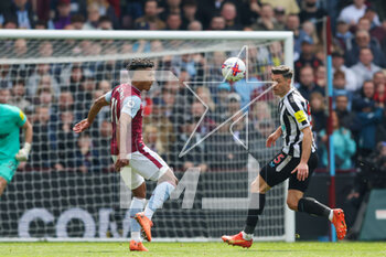 2023-04-15 - Aston Villa forward Ollie Watkins and Fabian Schar of Newcastle during the English championship Premier League football match between Aston Villa and Newcastle United on 15 April 2023 at Villa Park in Birmingham, England - FOOTBALL - ENGLISH CHAMP - ASTON VILLA V NEWCASTLE - ENGLISH PREMIER LEAGUE - SOCCER