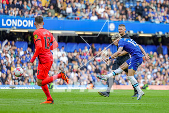 2023-04-15 - Mykhaylo Mudryk (15) of Chelsea shoots during the English championship Premier League football match between Chelsea and Brighton and Hove Albion on 15 April 2023 at Stamford Bridge in London, England - FOOTBALL - ENGLISH CHAMP - CHELSEA V BRIGHTON - ENGLISH PREMIER LEAGUE - SOCCER