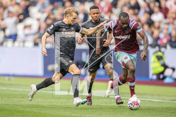 2023-04-16 - West Ham United forward Michail Antonio (9) and Arsenal midfielder Martin Odegaard during the English championship Premier League football match between West Ham United and Arsenal on 16 April 2023 at the London Stadium in London, England - FOOTBALL - ENGLISH CHAMP - WEST HAM V ARSENAL - ENGLISH PREMIER LEAGUE - SOCCER