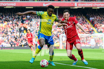 2023-04-22 - Taiwo Awoniyi of Nottingham Forest and Andrew Robertson of Liverpool during the English championship Premier League football match between Liverpool and Nottingham Forest on 22 April 2023 at Anfield stadium in Liverpool, England - FOOTBALL - ENGLISH CHAMP - LIVERPOOL V NOTTINGHAM FOREST - ENGLISH PREMIER LEAGUE - SOCCER