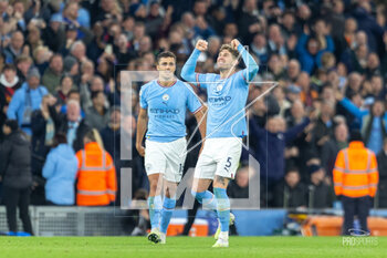 2023-04-26 - Manchester City defender John Stones (5) scores and celebrates after a VAR check 2-0 during the English championship Premier League football match between Manchester City and Arsenal on 26 April 2023 at the Etihad Stadium in Manchester, England - FOOTBALL - ENGLISH CHAMP - MANCHESTER CITY V ARSENAL - ENGLISH PREMIER LEAGUE - SOCCER