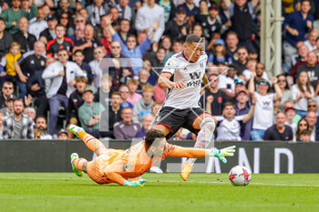 2023-04-30 - Ederson (31) of Manchester City brings down Carlos Vinicius (30) of Fulham during the English championship Premier League football match between Fulham and Manchester City on 30 April 2023 at Craven Cottage in London, England - FOOTBALL - ENGLISH CHAMP - FULHAM V MANCHESTER CITY - ENGLISH PREMIER LEAGUE - SOCCER
