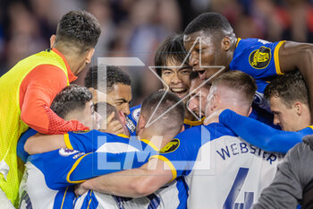 2023-05-04 - Brighton & Hove Albion midfielder Alexis Mac Allister (10) celebrates his goal 1-0 with teammates during the English championship Premier League football match between Brighton and Hove Albion and Manchester United on 4 May 2023 at the American Express Community Stadium in Brighton and Hove, England - FOOTBALL - ENGLISH CHAMP - BRIGHTON V MANCHESTER UNITED - ENGLISH PREMIER LEAGUE - SOCCER
