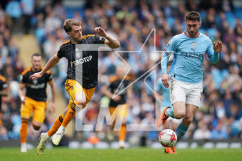 2023-05-06 - Leeds United forward Patrick Bamford and Aymeric Laporte of Manchester City during the English championship Premier League football match between Manchester City and Leeds United on 6 May 2023 at the Etihad Stadium in Manchester, England - FOOTBALL - ENGLISH CHAMP - MANCHESTER CITY V LEEDS - ENGLISH PREMIER LEAGUE - SOCCER