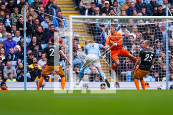 2023-05-06 - Leeds United goalkeeper Joel Robles (22) punches the ball away from Manchester City forward Erling Haaland (9) during the English championship Premier League football match between Manchester City and Leeds United on 6 May 2023 at the Etihad Stadium in Manchester, England - FOOTBALL - ENGLISH CHAMP - MANCHESTER CITY V LEEDS - ENGLISH PREMIER LEAGUE - SOCCER