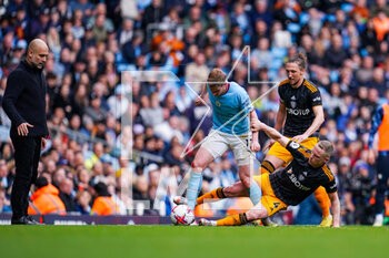2023-05-06 - Leeds United midfielder Adam Forshaw (4) tackles Manchester City midfielder Kevin De Bruyne (17) during the English championship Premier League football match between Manchester City and Leeds United on 6 May 2023 at the Etihad Stadium in Manchester, England - FOOTBALL - ENGLISH CHAMP - MANCHESTER CITY V LEEDS - ENGLISH PREMIER LEAGUE - SOCCER
