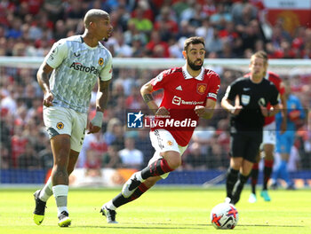 2023-05-13 - Wolverhampton Wanderers Midfielder Mario Lemina and Manchester United Midfielder Bruno Fernandez during the English championship Premier League football match between Manchester United and Wolverhampton Wanderers on 13 May 2023 at Old Trafford in Manchester, England - FOOTBALL - ENGLISH CHAMP - MANCHESTER UNITED V WOLVERHAMPTON - ENGLISH PREMIER LEAGUE - SOCCER