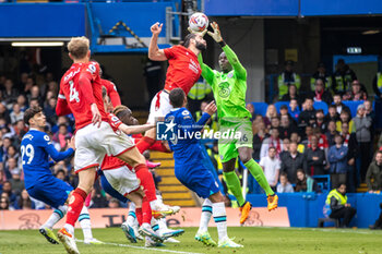 2023-05-13 - Nottingham Forest defender Felipe (38) challenges Chelsea goalkeeper Edouard Mendy (16) in the air during the English championship Premier League football match between Chelsea and Nottingham Forest on 13 May 2023 at Stamford Bridge in London, England - FOOTBALL - ENGLISH CHAMP - CHELSEA V NOTTINGHAM - ENGLISH PREMIER LEAGUE - SOCCER