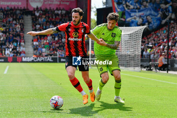 2023-05-20 - Adam Smith (15) of AFC Bournemouth on the attack is chased by Victor Lindelof (2) of Manchester United during the English championship Premier League football match between Bournemouth and Manchester United on 20 May 2023 at the Vitality Stadium in Bournemouth, England - FOOTBALL - ENGLISH CHAMP - BOURNEMOUTH V MANCHESTER UNITED - ENGLISH PREMIER LEAGUE - SOCCER