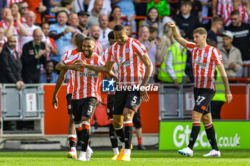 2023-05-29 - Ethan Pinnock (5) of Brentford scores a goal and celebrates 1-0 during the English championship Premier League football match between Brentford and Manchester City on 28 May 2023 at Gtech Community Stadium in Brentford, England - FOOTBALL - ENGLISH CHAMP - BRENTFORD V MANCHESTER CITY - ENGLISH PREMIER LEAGUE - SOCCER