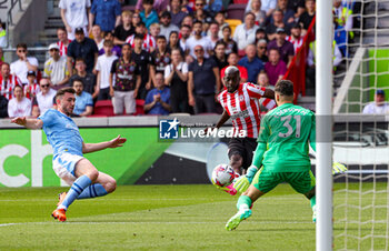 2023-05-29 - Yoane Wissa (11) of Brentford shoots towards the goal during the English championship Premier League football match between Brentford and Manchester City on 28 May 2023 at Gtech Community Stadium in Brentford, England - FOOTBALL - ENGLISH CHAMP - BRENTFORD V MANCHESTER CITY - ENGLISH PREMIER LEAGUE - SOCCER