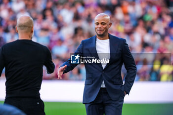 2023-08-11 - Vincent Kompany of Burnley (Manager) greets Josep Guardiola of Manchester City (Manager) during the English championship Premier League football match between Burnley and Manchester City on 11 August 2023 at Turf Moor in Burnley, England - FOOTBALL - ENGLISH CHAMP - BURNLEY V MANCHESTER CITY - ENGLISH PREMIER LEAGUE - SOCCER