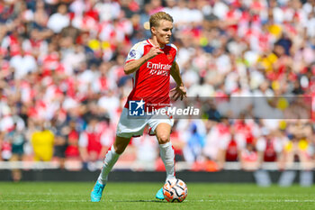2023-08-12 - Arsenal midfielder Martin Odegaard during the English championship Premier League football match between Arsenal and Nottingham Forest on 12 August 2023 at the Emirates Stadium in London, England - FOOTBALL - ENGLISH CHAMP - ARSENAL V NOTTINGHAM - ENGLISH PREMIER LEAGUE - SOCCER