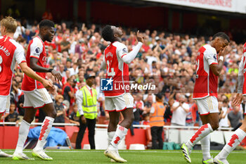 2023-08-12 - Arsenal forward Eddie Nketiah (14) scores 1-0 and celebrates during the English championship Premier League football match between Arsenal and Nottingham Forest on 12 August 2023 at the Emirates Stadium in London, England - FOOTBALL - ENGLISH CHAMP - ARSENAL V NOTTINGHAM - ENGLISH PREMIER LEAGUE - SOCCER