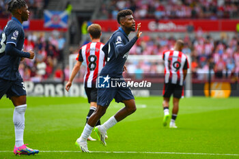 2023-08-13 - Tottenham Hotspur defender Emerson (12) scores 2-2 and celebrates during the English championship Premier League football match between Brentford and Tottenham Hotspur on 13 August 2023 at Gtech Community Stadium in Brentford, England - FOOTBALL - ENGLISH CHAMP - BRENTFORD V TOTTENHAM - ENGLISH PREMIER LEAGUE - SOCCER