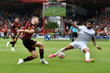 2023-08-12 - Lucas Paqueta (10) of West Ham United blocks the cross from Ryan Christie (10) of AFC Bournemouth during the English championship Premier League football match between Bournemouth and West Ham United on 12 August 2023 at the Vitality Stadium in Bournemouth, England - FOOTBALL - ENGLISH CHAMP - BOURNEMOUTH V WEST HAM - ENGLISH PREMIER LEAGUE - SOCCER