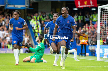 2023-08-13 - Chelsea defender Axel Disasi (2) scores and celebrates 1-1 during the English championship Premier League football match between Chelsea and Liverpool on 13 August 2023 at Stamford Bridge in London, England - FOOTBALL - ENGLISH CHAMP - CHELSEA V LIVERPOOL - ENGLISH PREMIER LEAGUE - SOCCER