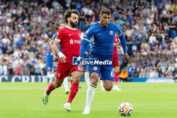 2023-08-13 - Liverpool forward Mohamed Salah (11) battles with Chelsea defender Thiago Silva (6) during the English championship Premier League football match between Chelsea and Liverpool on 13 August 2023 at Stamford Bridge in London, England - FOOTBALL - ENGLISH CHAMP - CHELSEA V LIVERPOOL - ENGLISH PREMIER LEAGUE - SOCCER