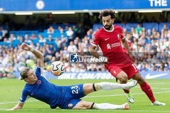 2023-08-13 - Liverpool forward Mohamed Salah (11) battles with Chelsea midfielder Conor Gallagher (23) during the English championship Premier League football match between Chelsea and Liverpool on 13 August 2023 at Stamford Bridge in London, England - FOOTBALL - ENGLISH CHAMP - CHELSEA V LIVERPOOL - ENGLISH PREMIER LEAGUE - SOCCER