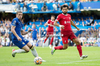 2023-08-13 - Liverpool forward Mohamed Salah (11) battles with Chelsea midfielder Conor Gallagher (23) during the English championship Premier League football match between Chelsea and Liverpool on 13 August 2023 at Stamford Bridge in London, England - FOOTBALL - ENGLISH CHAMP - CHELSEA V LIVERPOOL - ENGLISH PREMIER LEAGUE - SOCCER