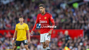2023-08-14 - Manchester United defender Raphael Varane during the English championship Premier League football match between Manchester United and Wolverhampton Wanderers on 14 August 2023 at Old Trafford in Manchester, England - FOOTBALL - ENGLISH CHAMP - MANCHESTER UNITED V WOLVERHAMPTON - ENGLISH PREMIER LEAGUE - SOCCER