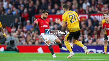 2023-08-14 - Manchester United midfielder Bruno Fernandes during the English championship Premier League football match between Manchester United and Wolverhampton Wanderers on 14 August 2023 at Old Trafford in Manchester, England - FOOTBALL - ENGLISH CHAMP - MANCHESTER UNITED V WOLVERHAMPTON - ENGLISH PREMIER LEAGUE - SOCCER