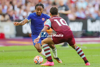 2023-08-20 - Chelsea forward Raheem Sterling (7) and West Ham United midfielder Lucas Paqueta (10) during the English championship Premier League football match between West Ham United and Chelsea on 20 August 2023 at the London Stadium in London, England - FOOTBALL - ENGLISH CHAMP - WEST HAM V CHELSEA - ENGLISH PREMIER LEAGUE - SOCCER