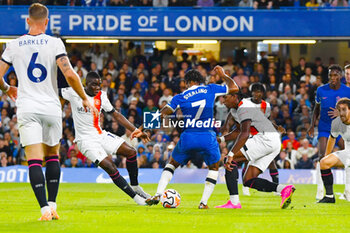 2023-08-25 - Chelsea forward Raheem Sterling (7) scores 1-0 during the English championship Premier League football match between Chelsea and Luton Town on 25 August 2023 at Stamford Bridge in London, England - FOOTBALL - ENGLISH CHAMP - CHELSEA V LUTON TOWN - ENGLISH PREMIER LEAGUE - SOCCER