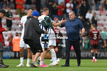 2023-08-26 - Tottenham Hotspur manager Ange Postecoglou congratulates Dejan Kulusevski (21) of Tottenham Hotspur at full time during the English championship Premier League football match between Bournemouth and Tottenham Hotspur on 26 August 2023 at the Vitality Stadium in Bournemouth, England - FOOTBALL - ENGLISH CHAMP - BOURNEMOUTH V TOTTENHAM - ENGLISH PREMIER LEAGUE - SOCCER