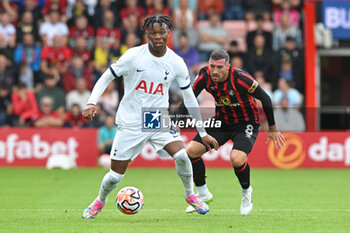 2023-08-26 - Destiny Udogie (38) of Tottenham Hotspur and Joe Rothwell (8) of AFC Bournemouth during the English championship Premier League football match between Bournemouth and Tottenham Hotspur on 26 August 2023 at the Vitality Stadium in Bournemouth, England - FOOTBALL - ENGLISH CHAMP - BOURNEMOUTH V TOTTENHAM - ENGLISH PREMIER LEAGUE - SOCCER