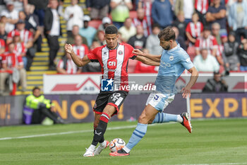 2023-08-27 - William Osula (32) of Sheffield United and Ruben Dias (3) of Manchester City during the English championship Premier League football match between Sheffield United and Manchester City on 27 August 2023 at Bramall Lane in Sheffield, England - FOOTBALL - ENGLISH CHAMP - SHEFFIELD V MANCHESTER CITY - ENGLISH PREMIER LEAGUE - SOCCER