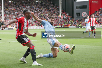 2023-08-27 - Bénie Traoré (11) of Sheffield United and Josko Gvardiol (24) of Manchester City during the English championship Premier League football match between Sheffield United and Manchester City on 27 August 2023 at Bramall Lane in Sheffield, England - FOOTBALL - ENGLISH CHAMP - SHEFFIELD V MANCHESTER CITY - ENGLISH PREMIER LEAGUE - SOCCER