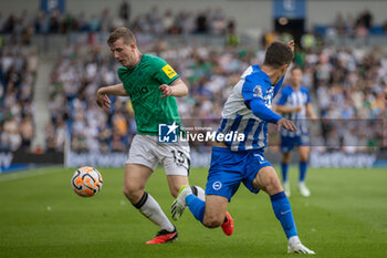 2023-09-02 - Brighton & Hove Albion midfielder Solly March & Newcastle United defender Matt Targett during the Premier League match between Brighton and Hove Albion and Newcastle United at the American Express Stadium, Brighton and Hove, England on 2 September 2023. Photo Jane Stokes / Pro Sports Images / DPPI - FOOTBALL - ENGLISH CHAMP - BRIGHTON V NEWCASTLE - ENGLISH PREMIER LEAGUE - SOCCER