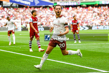 2023-09-16 - Goal 1-2 Bernardo Silva (20) of Manchester City scores a goal and celebratesy during the Premier League match between West Ham United and Manchester City at the London Stadium, London, England on 16 September 2023. Photo Nigel Keene/ProSportsImages / DPPI - FOOTBALL - ENGLISH CHAMP - WEST HAM V MANCHESTER CITY - ENGLISH PREMIER LEAGUE - SOCCER