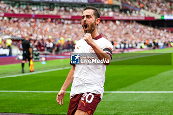 2023-09-16 - Goal 1-2 Bernardo Silva (20) of Manchester City scores a goal and celebratesy during the Premier League match between West Ham United and Manchester City at the London Stadium, London, England on 16 September 2023. Photo Nigel Keene/ProSportsImages / DPPI - FOOTBALL - ENGLISH CHAMP - WEST HAM V MANCHESTER CITY - ENGLISH PREMIER LEAGUE - SOCCER
