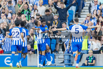 2023-10-08 - Brighton & Hove Albion FC forward Simon Adingra (24) celebrates his goal 1-0 during the English championship Premier League football match between Brighton and Hove Albion and Liverpool on 8 October 2023 at the American Express Stadium in Brighton and Hove, England - FOOTBALL - ENGLISH CHAMP - BRIGHTON V LIVERPOOL - ENGLISH PREMIER LEAGUE - SOCCER