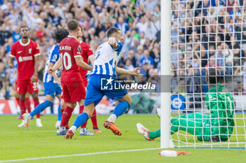 2023-10-08 - Brighton & Hove Albion FC defender Lewis Dunk (5) scores a goal 2-2 during the English championship Premier League football match between Brighton and Hove Albion and Liverpool on 8 October 2023 at the American Express Stadium in Brighton and Hove, England - FOOTBALL - ENGLISH CHAMP - BRIGHTON V LIVERPOOL - ENGLISH PREMIER LEAGUE - SOCCER