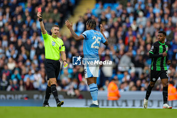 2023-10-21 - Manuel Akanji (25) of Manchester City receives a red card during the English championship Premier League football match between Manchester City and Brighton and Hove Albion on 21 October 2023 at the Etihad Stadium in Manchester, England - FOOTBALL - ENGLISH CHAMP - MANCHESTER CITY V BRIGHTON - ENGLISH PREMIER LEAGUE - SOCCER