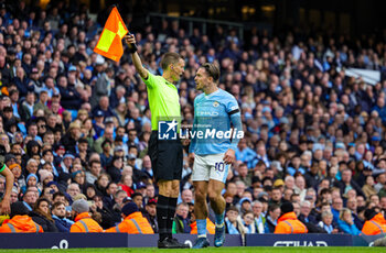 2023-10-21 - Jack Grealish (10) of Manchester City shouts at the referees assistant during the English championship Premier League football match between Manchester City and Brighton and Hove Albion on 21 October 2023 at the Etihad Stadium in Manchester, England - FOOTBALL - ENGLISH CHAMP - MANCHESTER CITY V BRIGHTON - ENGLISH PREMIER LEAGUE - SOCCER