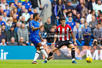 2023-10-29 - Raheem Sterling (7) of Chelsea and Christian Norgaard (6) of Brentford during the English championship Premier League football match between Chelsea and Brentford on 28 October 2023 at Stamford Bridge in London, England - FOOTBALL - ENGLISH CHAMP - CHELSEA V BRENTFORD - ENGLISH PREMIER LEAGUE - SOCCER