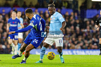2023-11-13 - Jeremy Doku (11) of Manchester City and Reece James (24) of Chelsea during the English championship Premier League football match between Chelsea and Manchester City on 12 November 2023 at Stamford Bridge in London, England - FOOTBALL - ENGLISH CHAMP - CHELSEA V MANCHESTER CITY - ENGLISH PREMIER LEAGUE - SOCCER